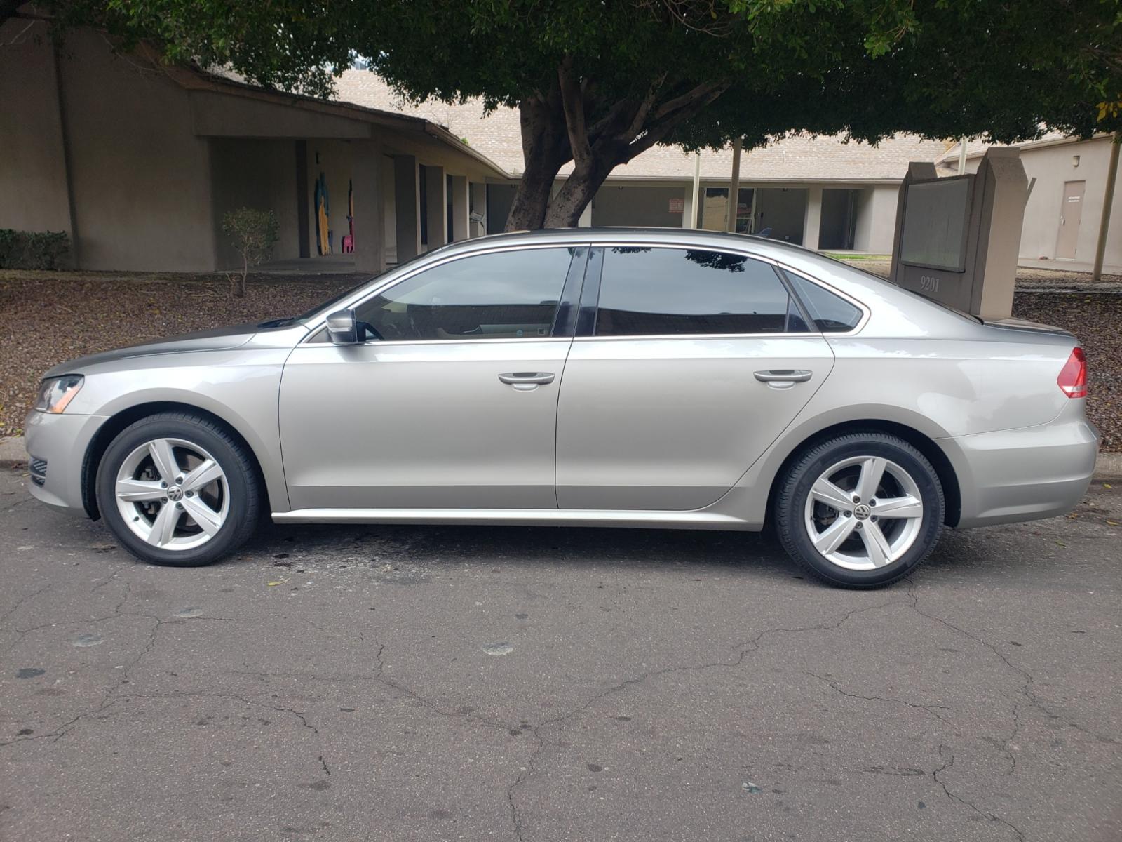 2013 /tan Volkswagen Passat SE (1VWBN7A32DC) with an 2.0L L4 DOHC 16V engine, 5-Speed Automatic transmission, located at 323 E Dunlap Ave., Phoenix, AZ, 85020, (602) 331-9000, 33.567677, -112.069000 - 2013 Volkswagen Passat TDI SE,....... ONLY 128K Miles..... EXCELLENT condition, A Real Must See!!.... No accidents, Ice cold ac front and rear, Stereo/CD Player, Satellite compatible, Bluetooth, Phone sync, Clean Tan interior with Tan Leather seats in near perfect condition, Gorgeous tinted sunroof, - Photo #6